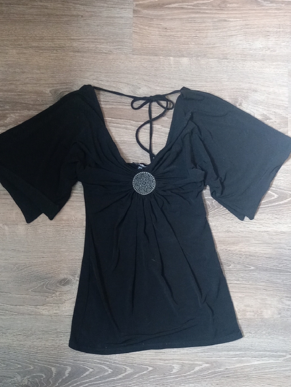 le chateau Black V-Neck Tie-Back Top with Medallion